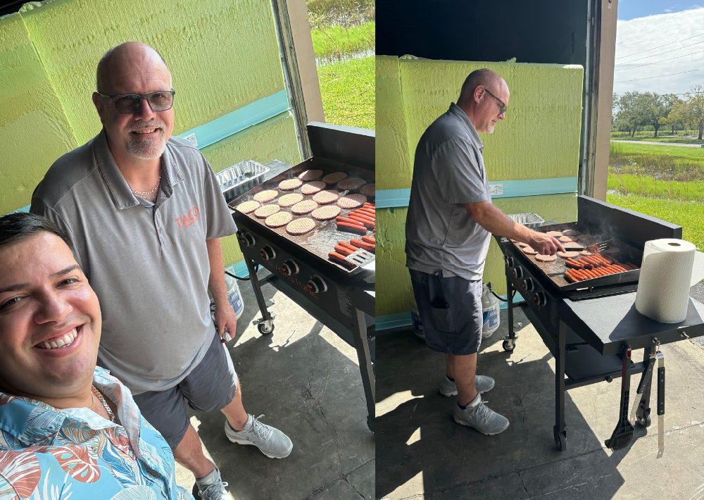 Sparta Shipping Manager Gene Bray with TACO Seating Production Manager Romeo Duarte during the cookout.